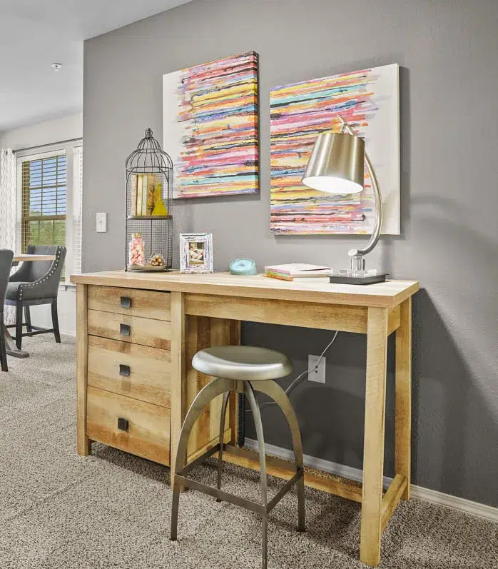 Carpeted living room at Portofino Apartments in Wichita, Kansas